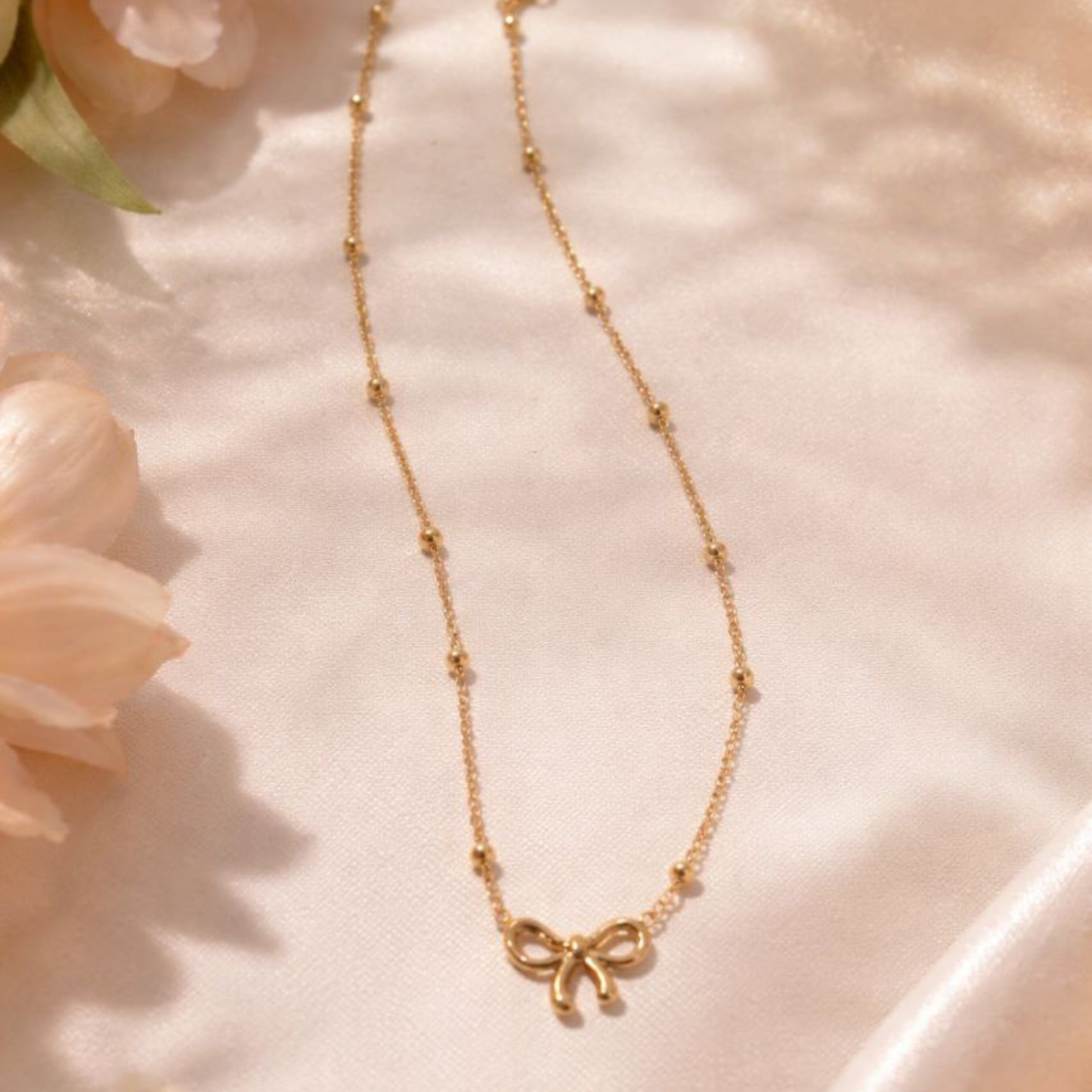 Golden Bow Whisper Necklace